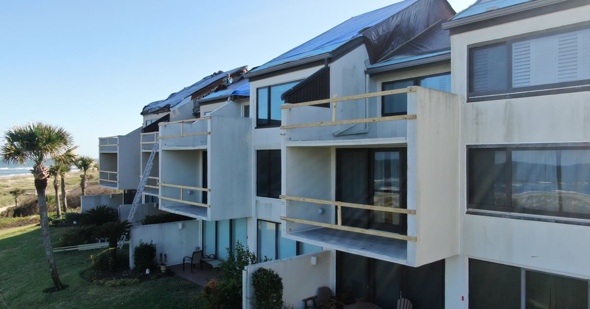 Drone view of the oceanside facade at Beach Walker during exterior renovation work.