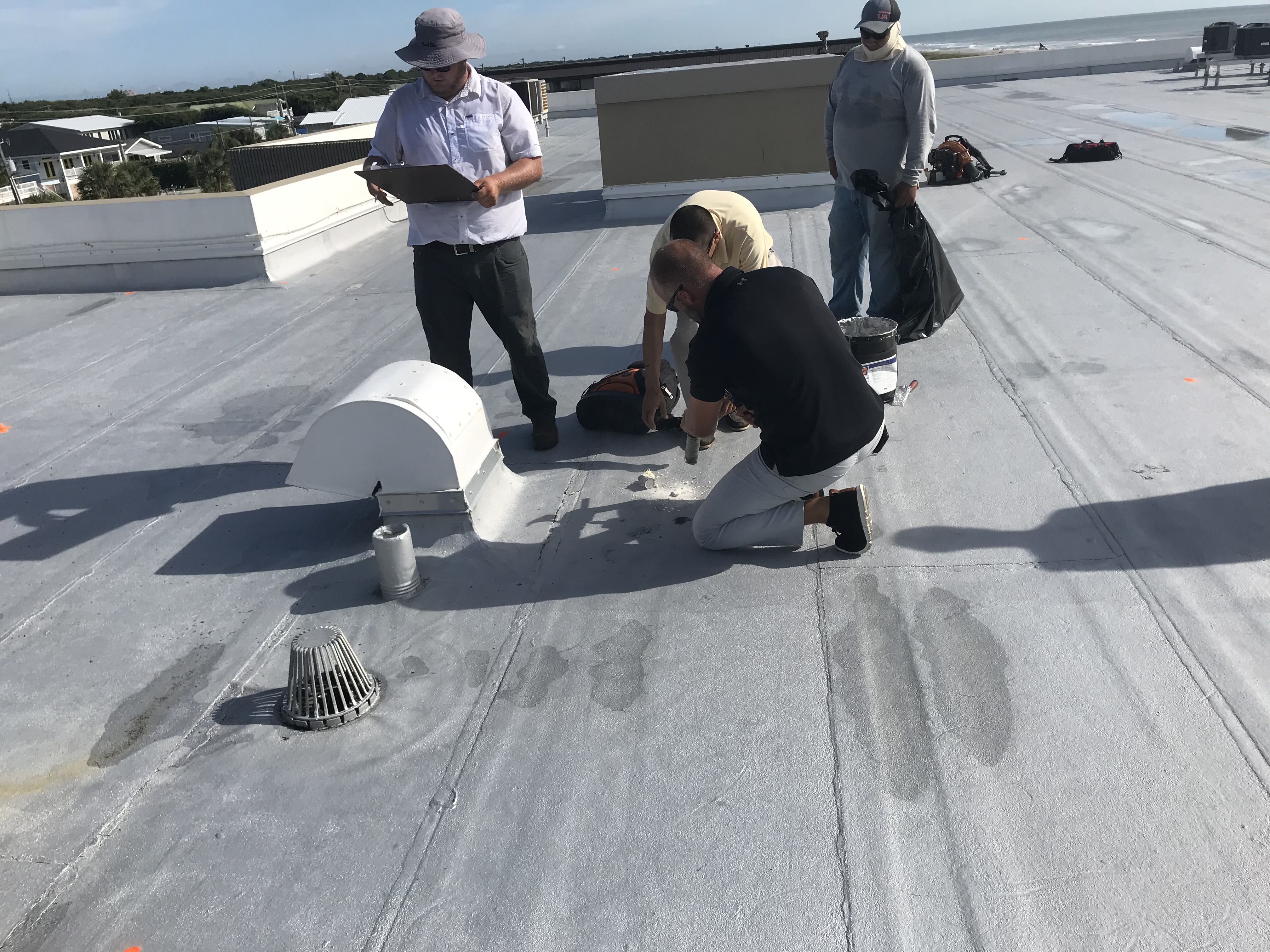 CSI engineering team conducting on-site consultation at a Florida condominium project