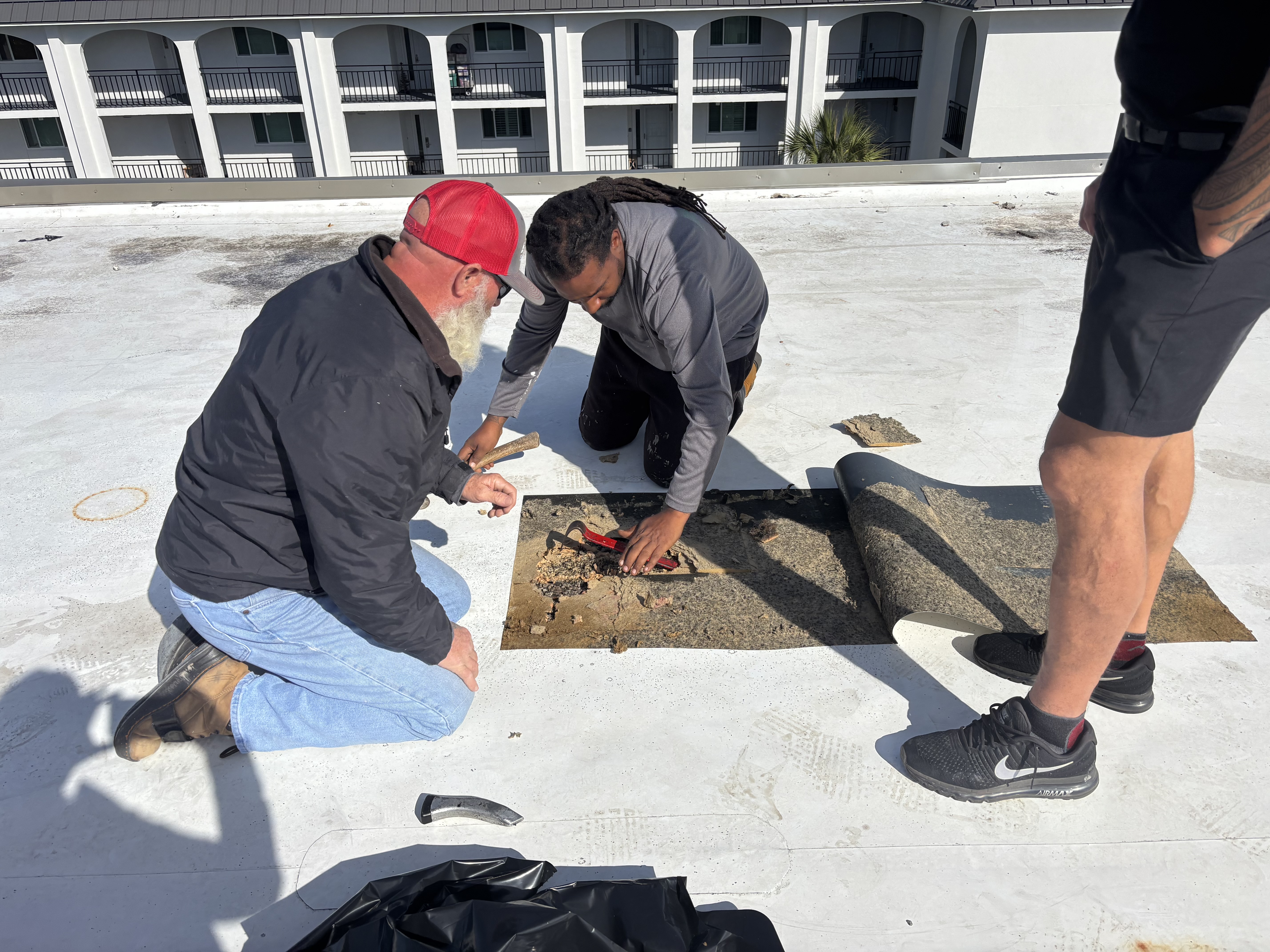 Flat roof membrane destructive testing to assess moisture damage in Florida