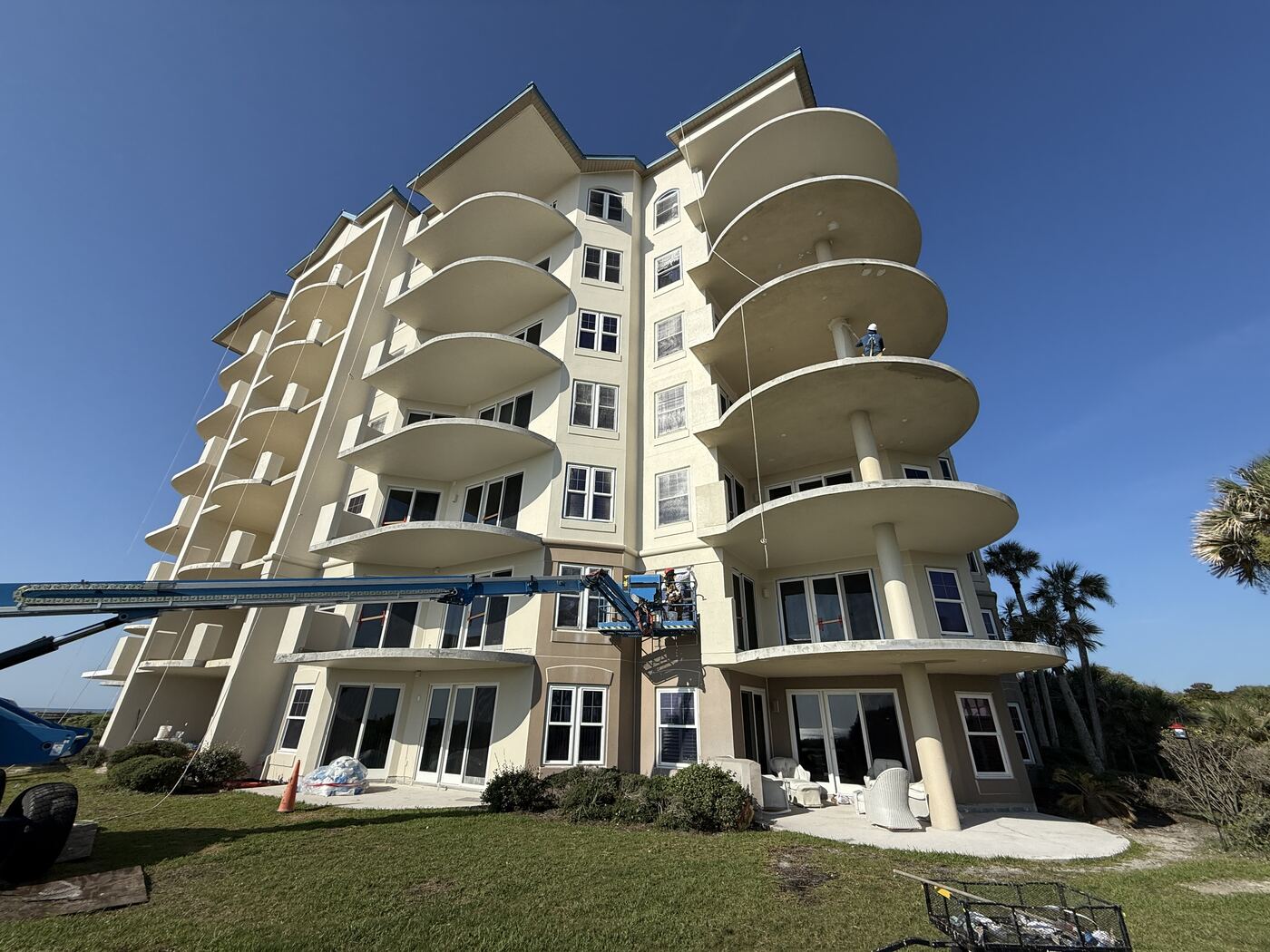 Boom lift at the Ocean Place Condominiums facade during the exterior renovation overseen by CSI