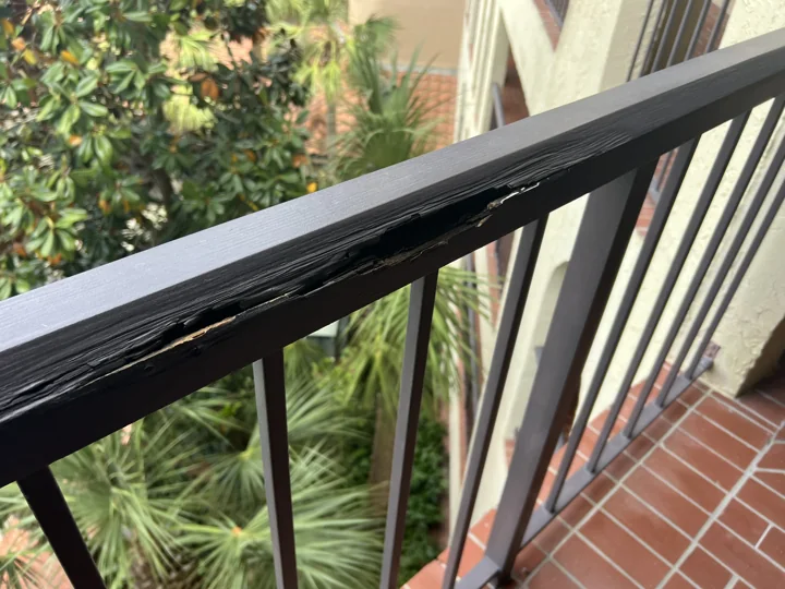 The original handrails had wood top rails and were replaced with fully welded aluminum handrails with a Kynar coating.