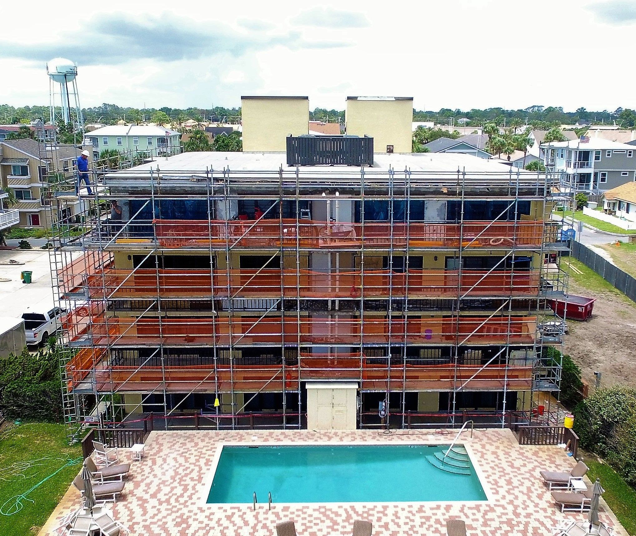 Scaffolding On Condominium Construction Project - CSI Design